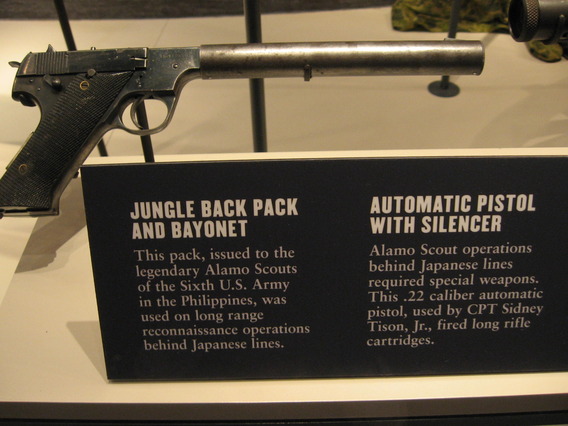 a silenced High Standard.  This one has an exposed hammer.