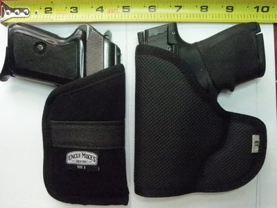 Comparing the pocket holsters. Width is close, but length of Mikes for the P64 is a little longer than the .40's DeSantis Nemesis